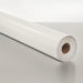 Roll of white vapor barrier on a gray surface